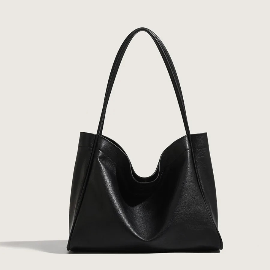 Womens leather handbag vintage large capacity commuting highquality casual shoulder bag name 250401
