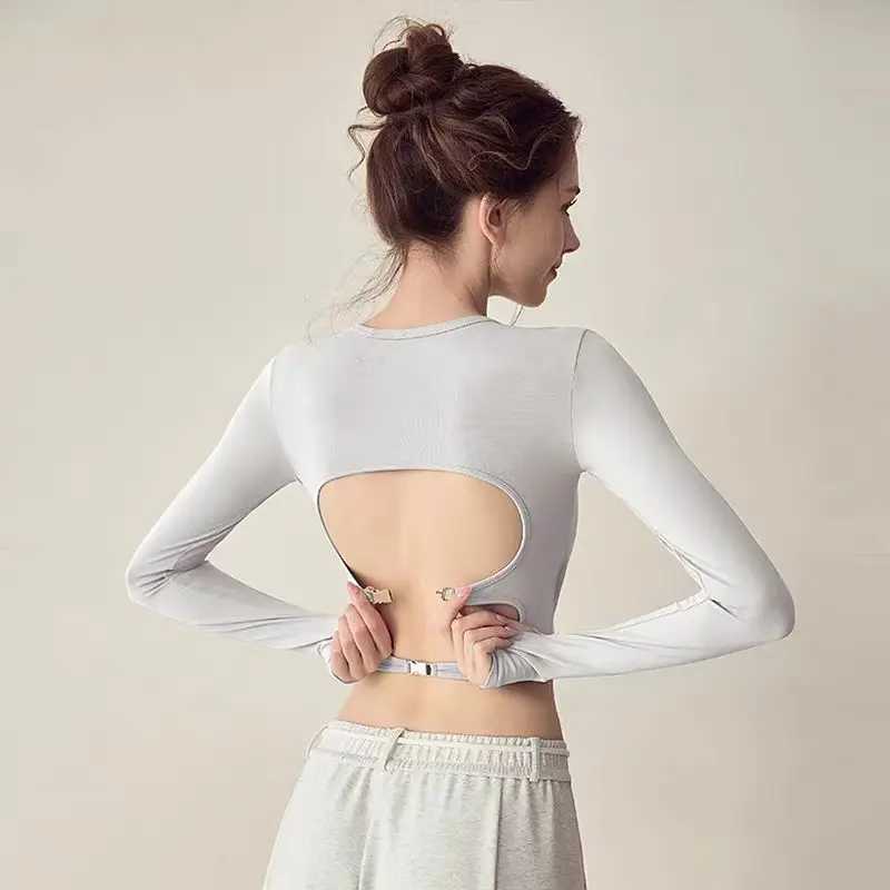 High end backless hollow long sleeved yoga sports top with padding quick drying and tight fitness T-shirt sexy yoga shirtXJ250410