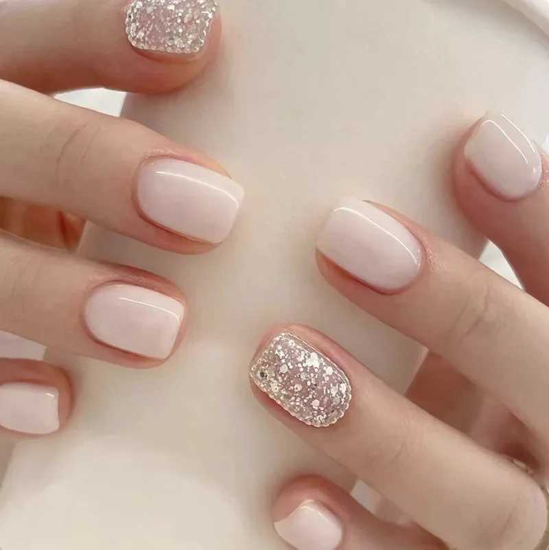24 pieces of milk white sparkling fake nails with jelly stickers pressed on top of the fake nails wearable round headed oval shaped fully covered nail