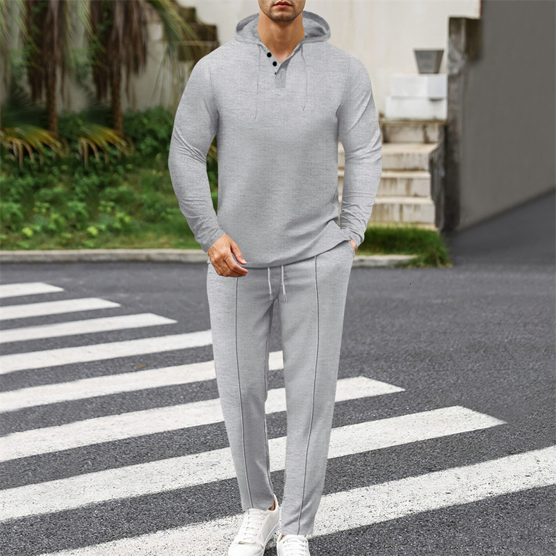 2024 autumn and winter new versatile loose hooded sweatshirt solid color sports and leisure long sleeved pants two-piece set