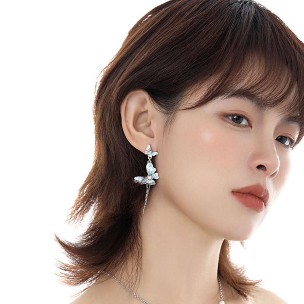 DHcollections Original Design Asymmetric Blue Butterfly for Women, Light Luxury Fashion Sweet Cool Versatile High-end 925 Silver Needle Earrings