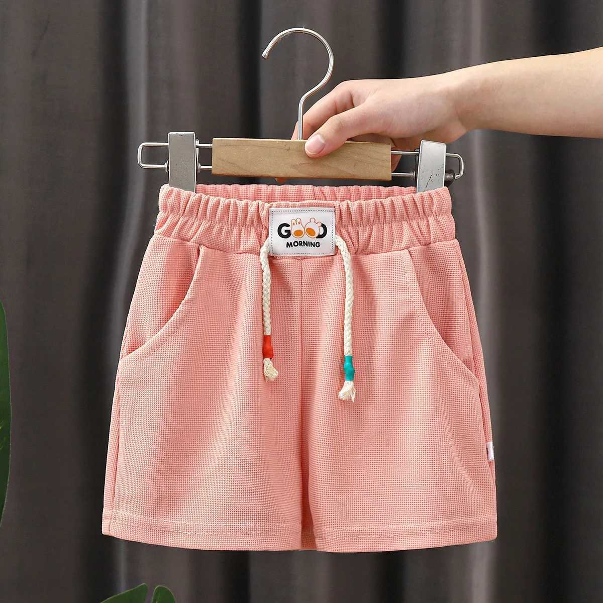 1 piece of summer childrens shorts boys and girls solid color shorts baby solid color casual shorts childrens shorts sportswear Z250410