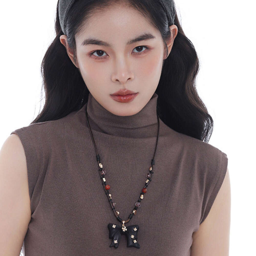Milad Wooden Bow Pendant Necklace Women, Autumn and Winter Original Design, Light Luxury Niche High-end Sweater Chain for Women