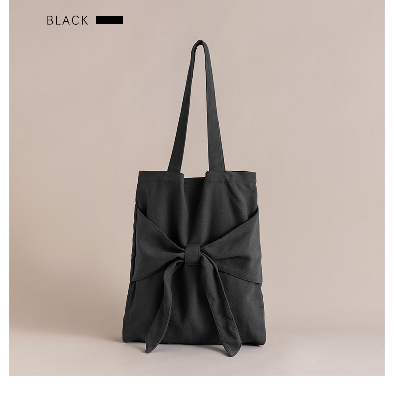 2025S New Model Designer Bag Bowtie Tote Artistic Single Shoulder Women S Student Canvas Bag Niche Design Large Capacity Handbag Totebag