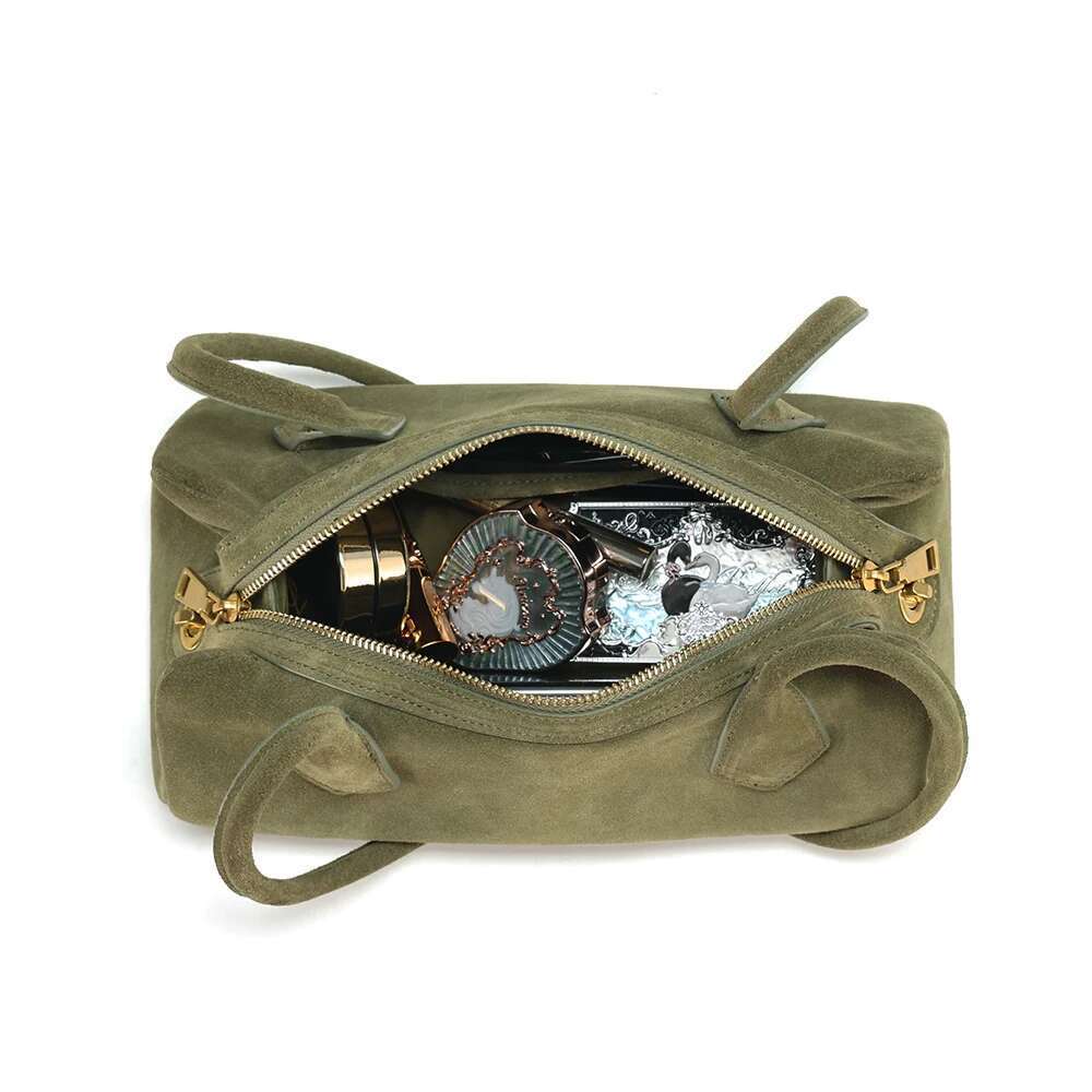 The New Sausage Is Cowhide Suede Shoulder Handbag A Simple And Fashionable Armpit Baguette Bag
