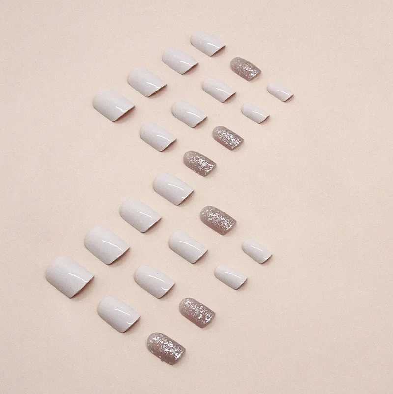 24 pieces of milk white sparkling fake nails with jelly stickers pressed on top of the fake nails wearable round headed oval shaped fully covered nail