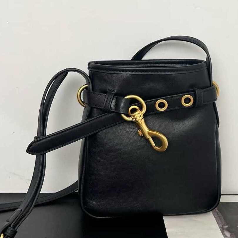 Cowhide designer bag winter new fashion commuting luxury handbag mobile phone bag retro style mini women's shoulder crossbody bag
