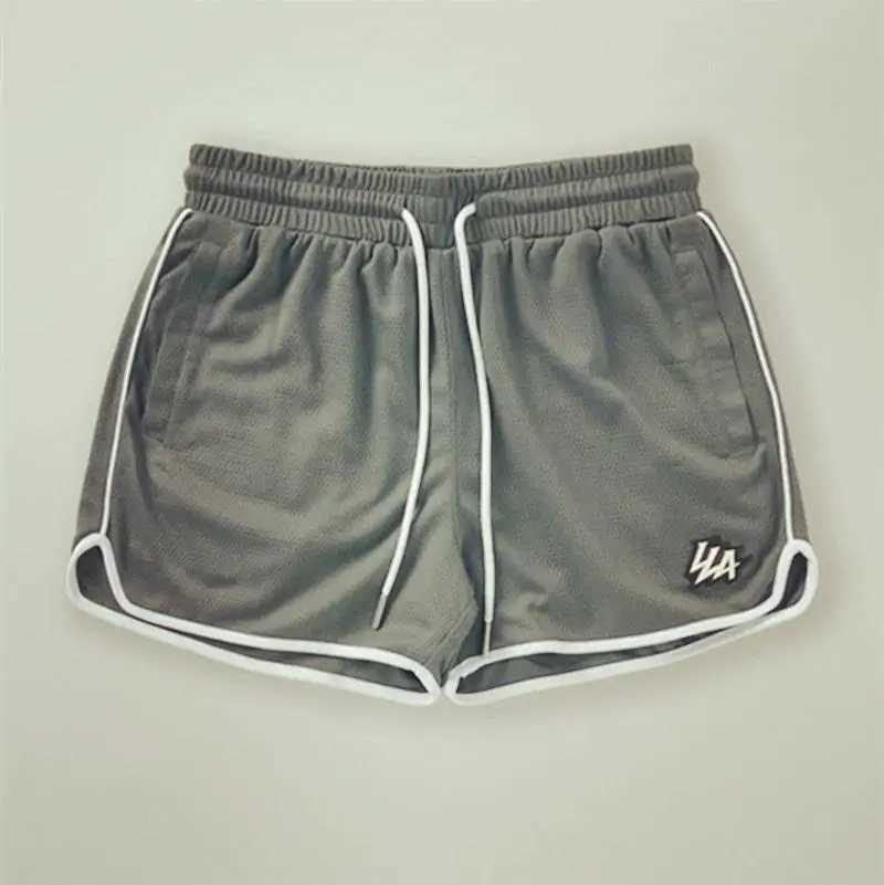Summer 2025 mens shorts mens and womens fashionable beach casual shorts mesh sports quick drying quarter pants X250410