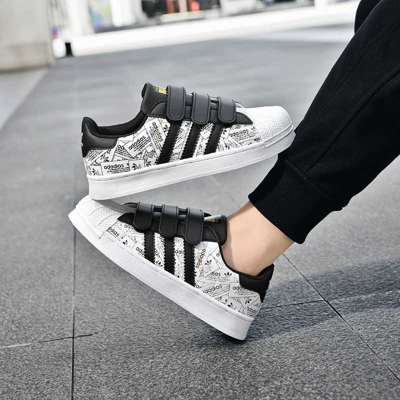 Shell-toe low-top white sneakers lightweight and breathable board shoes new womens childrens anti-slip sports shoes for boysT251110