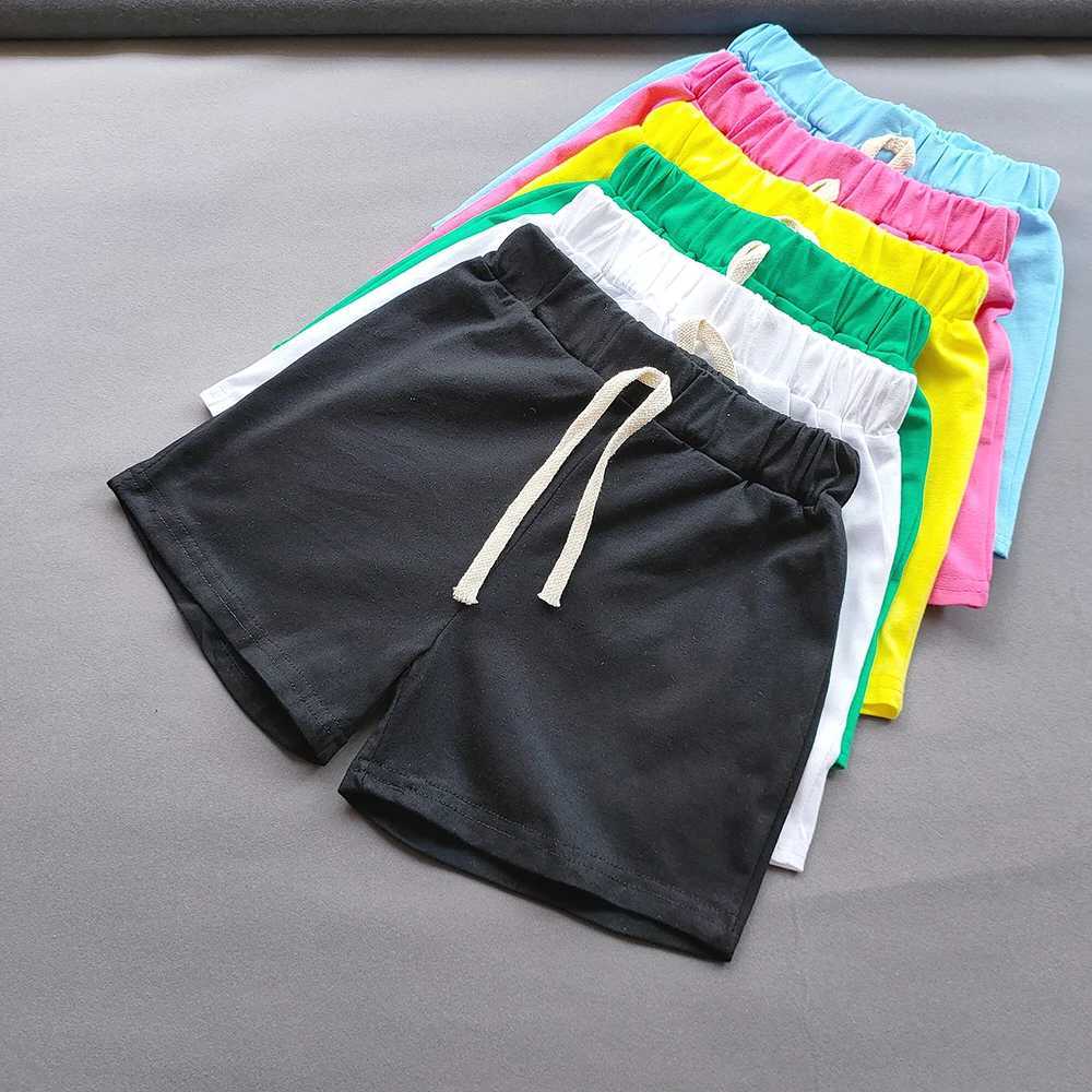 Summer girls boys shorts Korean candy color sports shorts girls cotton hot pants casual childrens beach shorts Z250410