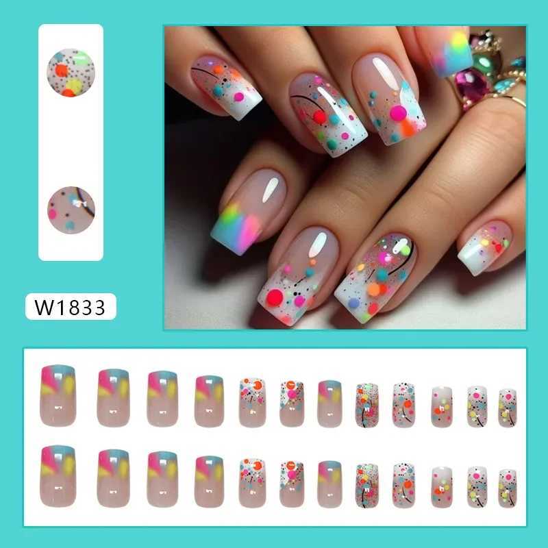24 fake nails with watercolor stains with jelly stickers pressed on top of the fake nails wearable round headed oval shaped fully covered nail tips W2