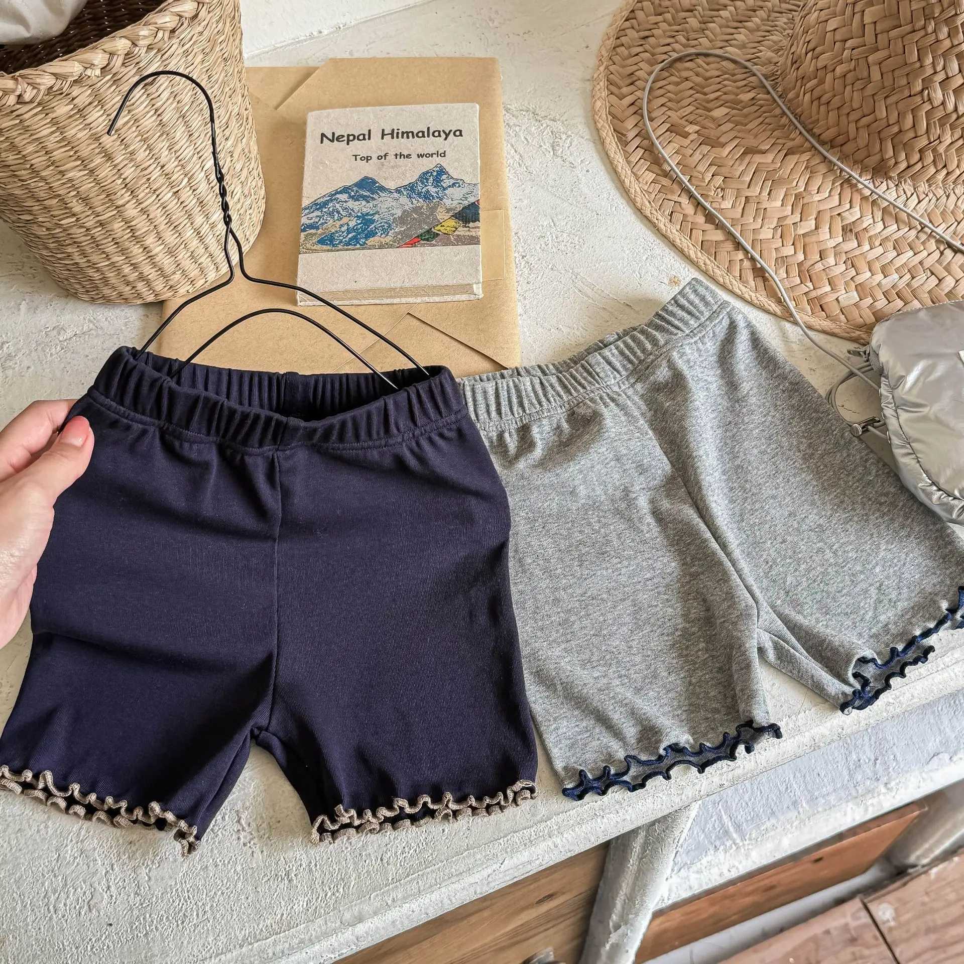 Summer 2025 New Girls Lace Shorts Solid Color Childrens Casual Pants Baby Safety Pants Childrens Anti Slip Shorts Baby Clothing Z250410