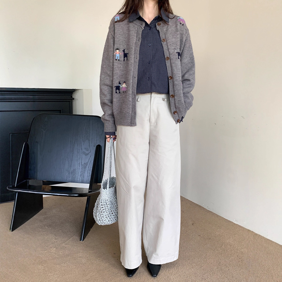 Cardigan sweater women's 2025 autumn and winter new Korean designer lazy loose slimming versatile button round neck knitted jacket