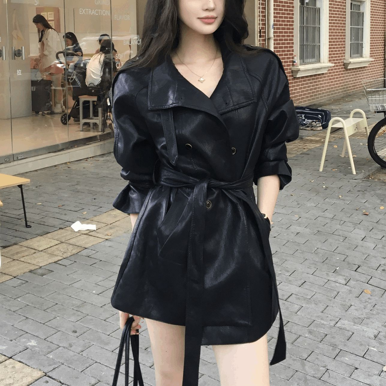 Black Jacket for Women, Mid-Length, Autumn Style, Korean Version, Stand Collar, Belted Windbreaker, PU Leather Coat dongdumaoyi