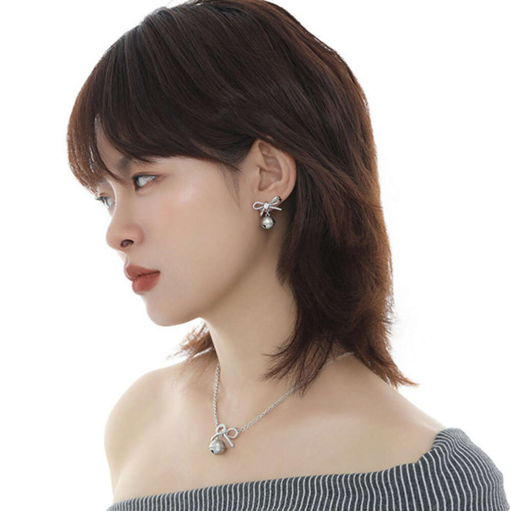 DHcollections Butterfly Knot Bell Earrings for Women, Niche Sweet Design, Original Personality Fashionable Temperament 925 Silver Needle Ear Jewelry