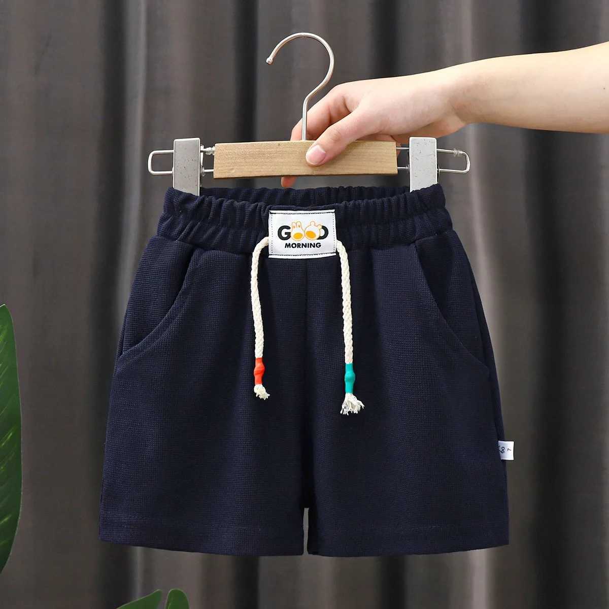 1 piece of summer childrens shorts boys and girls solid color shorts baby solid color casual shorts childrens shorts sportswear Z250410