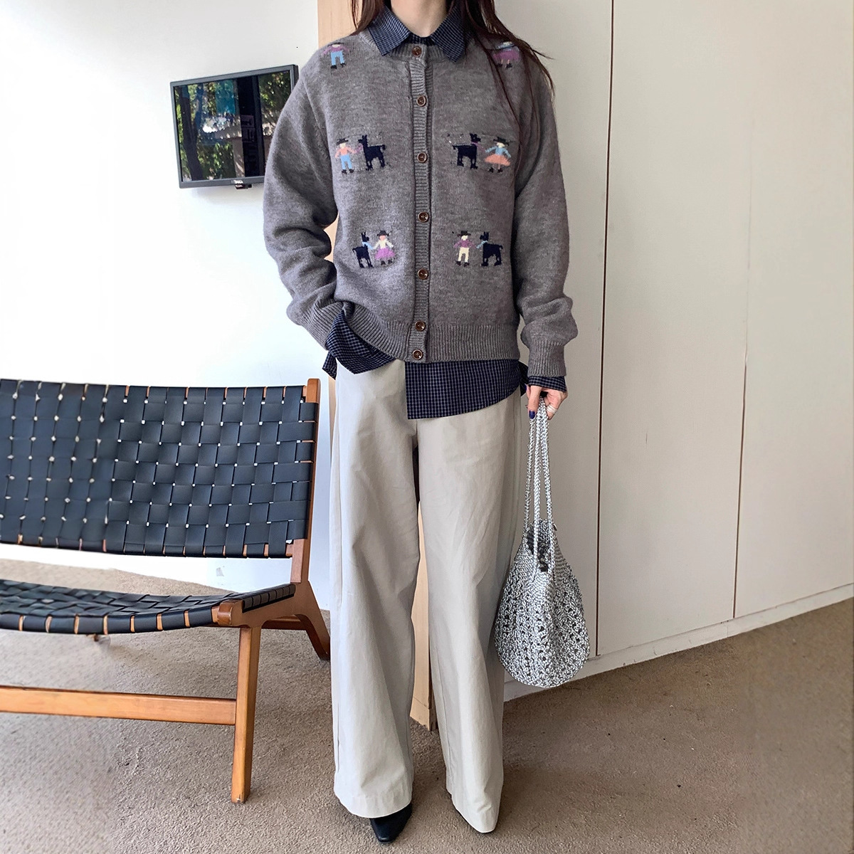 Cardigan sweater women's 2025 autumn and winter new Korean designer lazy loose slimming versatile button round neck knitted jacket