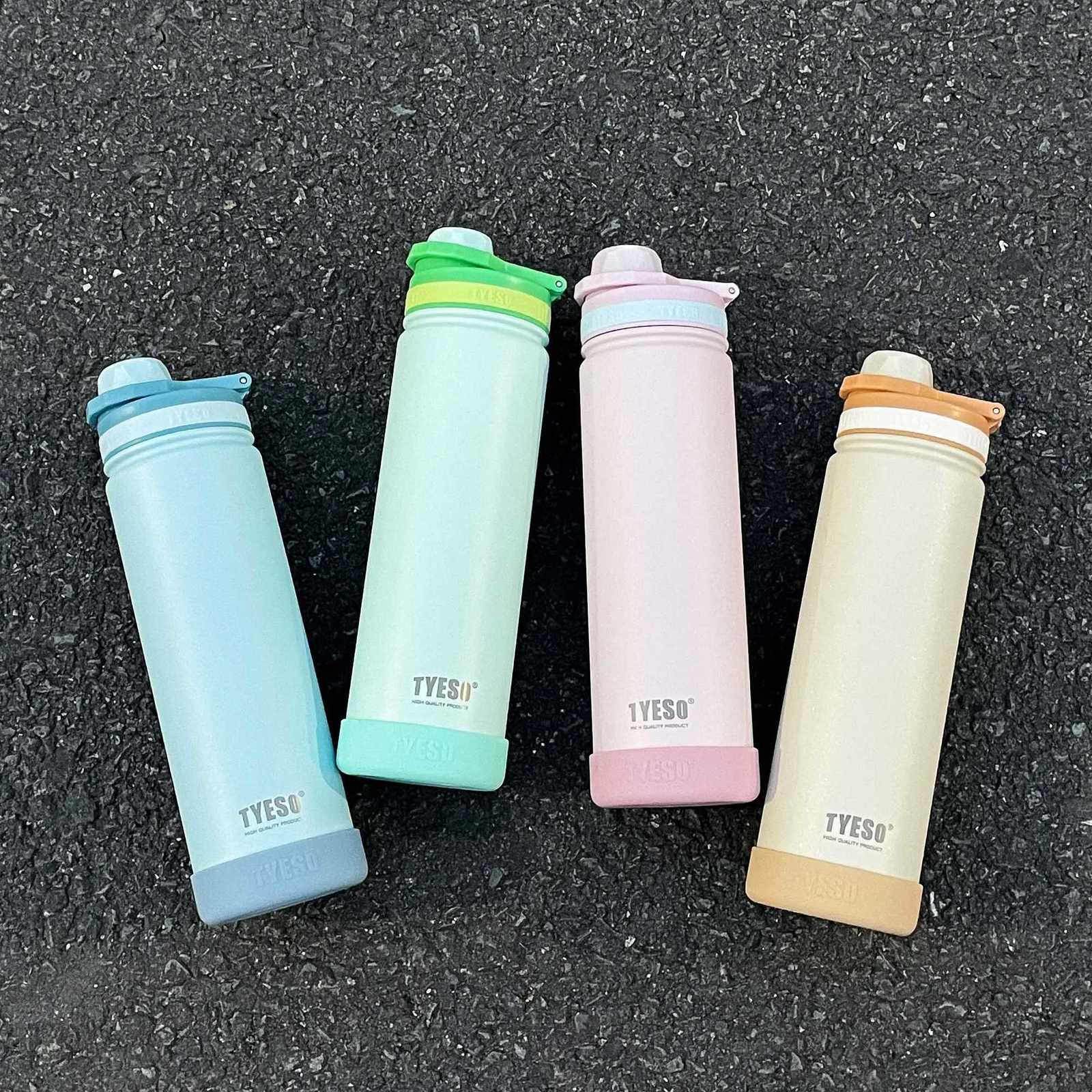 Fashionable cup 1pc high-quality vacuum stainless steel insated bottle 750 ML portable water cup with a handle and a carrying strap Y251110