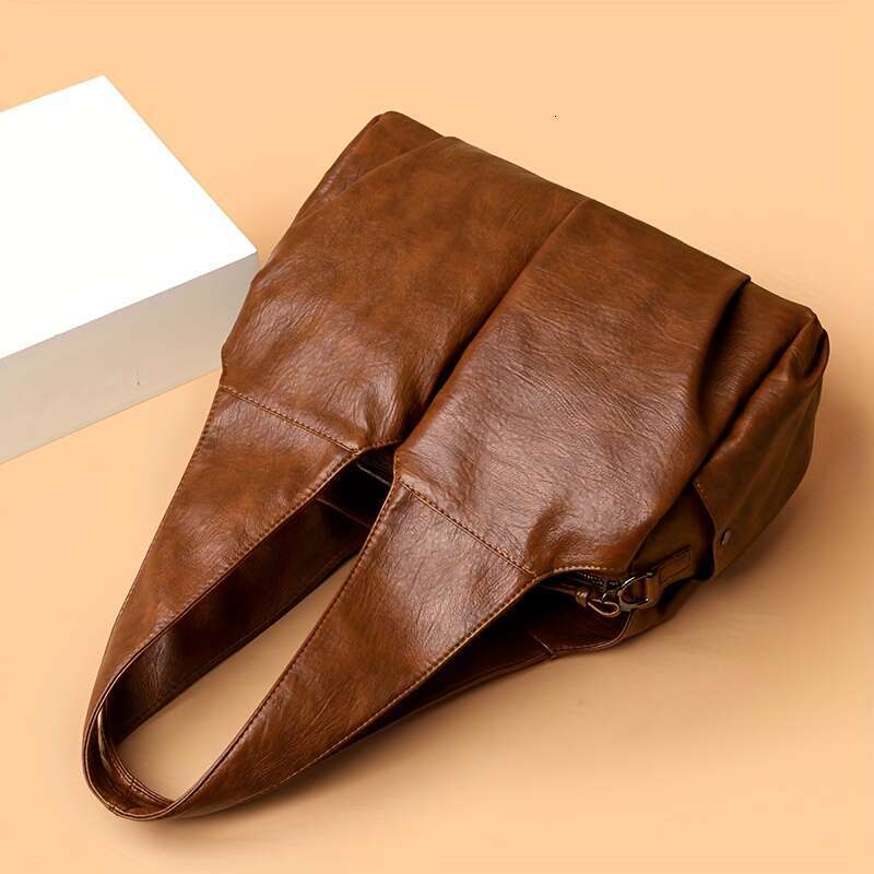 Vintage Style Women S Handbag Featuring An Elegant V Shaped Silhouette Soft Leather Offers Delicate Touch And Versatile Carrying Options That Easily