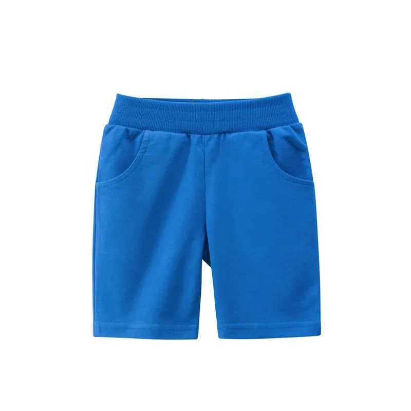 Summer 2025 childrens cotton shorts boys and girls solid color childrens underwear pockets childrens beach shorts sports pants baby Z250410