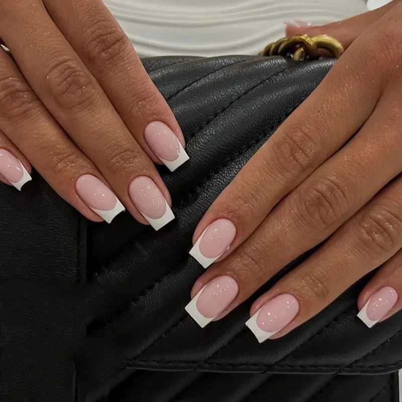 Simple white French wearable rectangular fake nails fully covered detachable with glue embossed on the nails. Wholesale of fake nails W250410