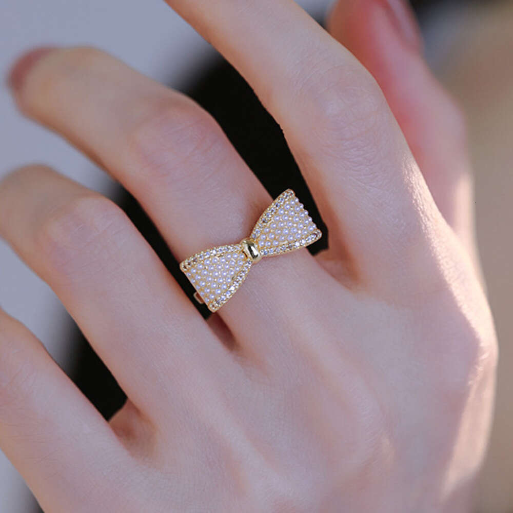 DHcollections Gentle Fairy Style Big Bow Pearl French Retro High-end Light Luxury Versatile Elegant Index Finger Ring for Women