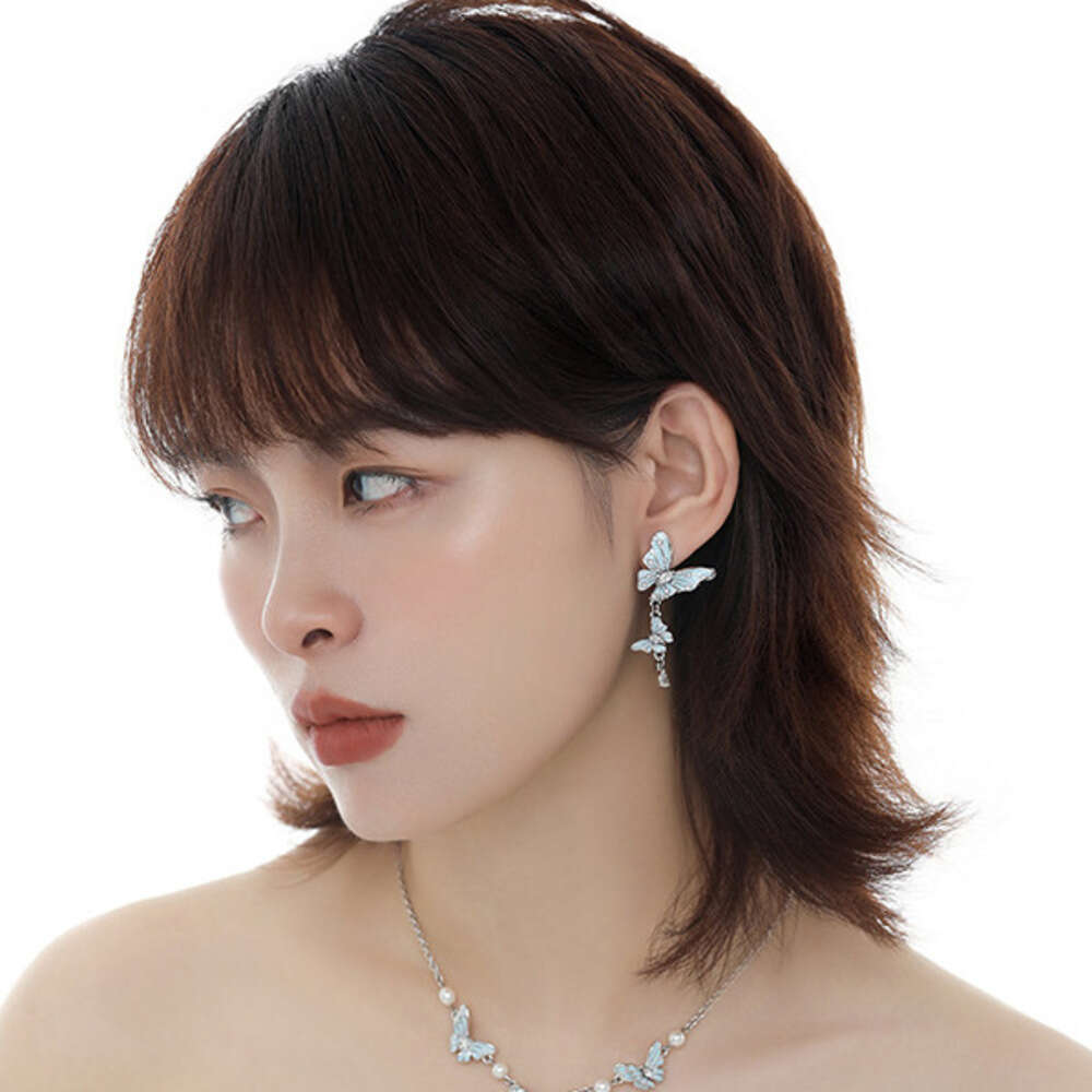 DHcollections Original Design Asymmetric Blue Butterfly for Women, Light Luxury Fashion Sweet Cool Versatile High-end 925 Silver Needle Earrings