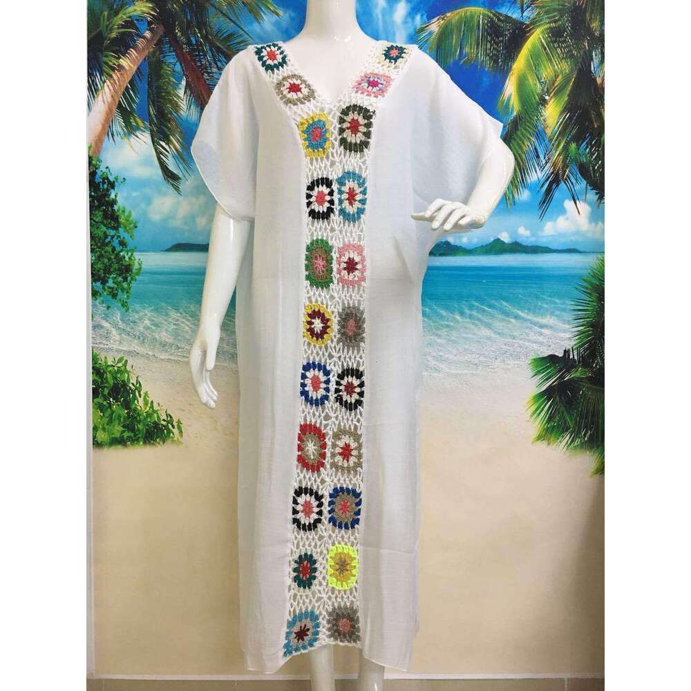 New hand hook wer spliced beach cover, elongated hollow out fashionable loose sun protection long skirt, 2025 new casual fashion trend clothing