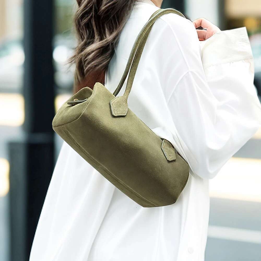 The New Sausage Is Cowhide Suede Shoulder Handbag A Simple And Fashionable Armpit Baguette Bag