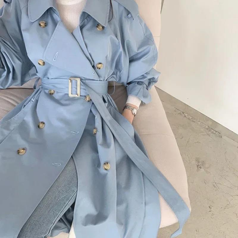 Korean womens medium length windproof machine with shoulder strap and split button n blue beige casual doublelayer long sleeved trench coat 250410