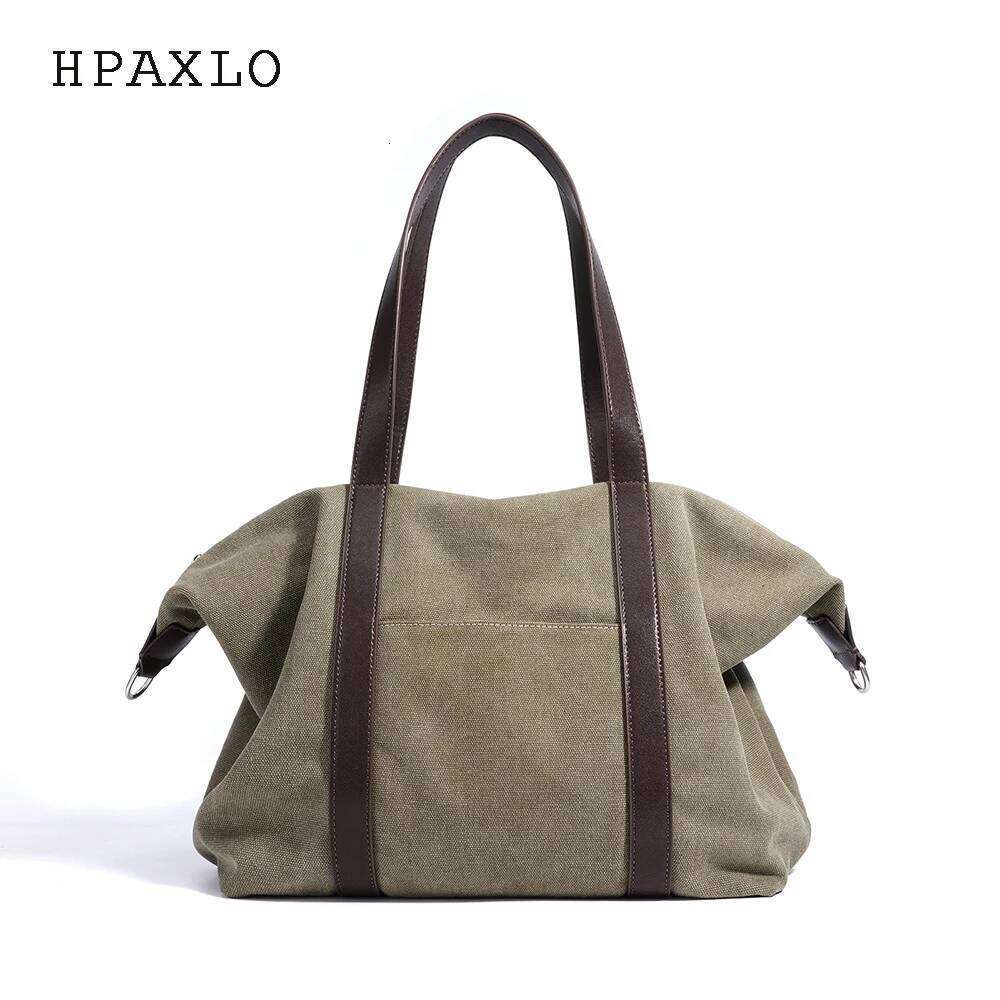 Canvas Travel Tote Bag New Niche Design Simple Casual Large Capacity Men And Women Same Fashion Hand-Laundry Shoulder Bag 251110