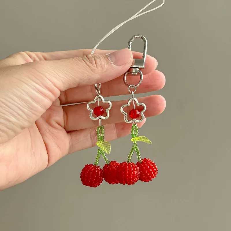 Simple and cute cherry phone pendant handmade bead decoration bag pendant keychain W250411