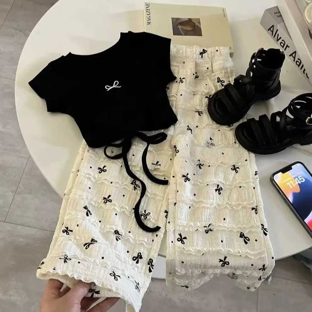 Childrens girl bow T-shirt+loose pants 2-piece summer childrens clothing set short sleeved backless T-shirt bow tie pants girl setXJ250410