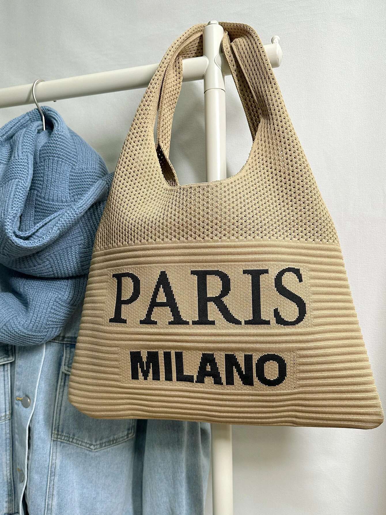2025 new autumn and winter fashion designer women's one shoulder retro letter cut knitted handbag crochet fabric shopping2