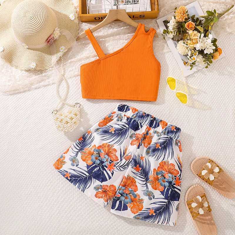 Fashion 8-12 year old childrens and girls clothing set orange asymmetrical suspender and printed mini countryside sled leisure vacation setXJ250410