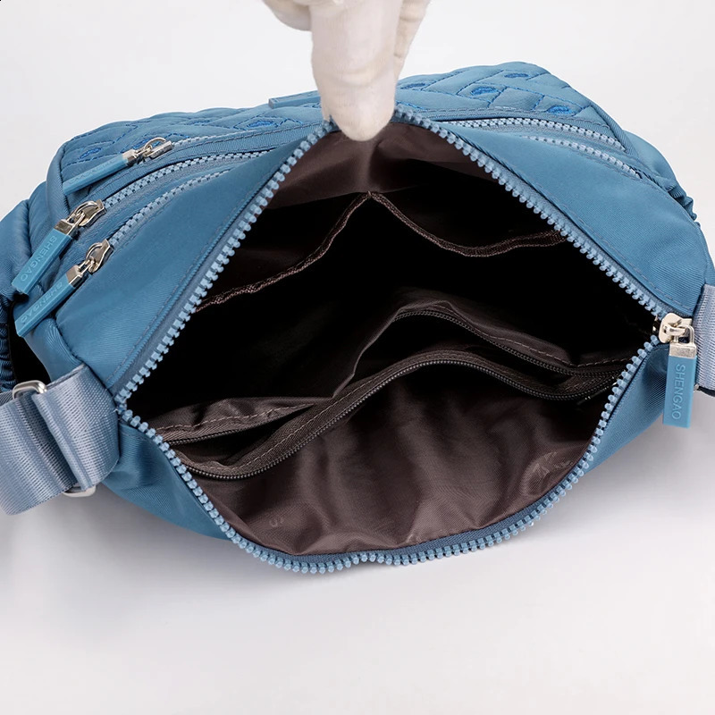 Womens zipper nylon cross body bag shoulder waterproof large capacity solid color suitable for womens travel and daily use 250401