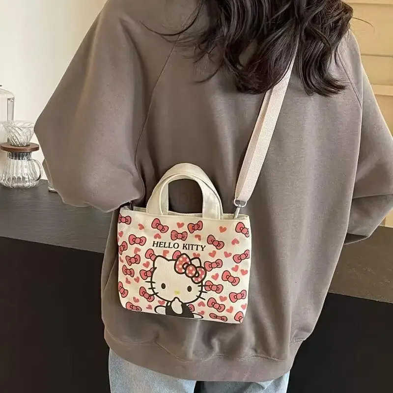 Sanrio Girl Cartoon Canvas Handbag Hello Kitty Student Sweet Kawaii Shoulder Bag Versatile Portable Backpack Travel Handbag New H251111