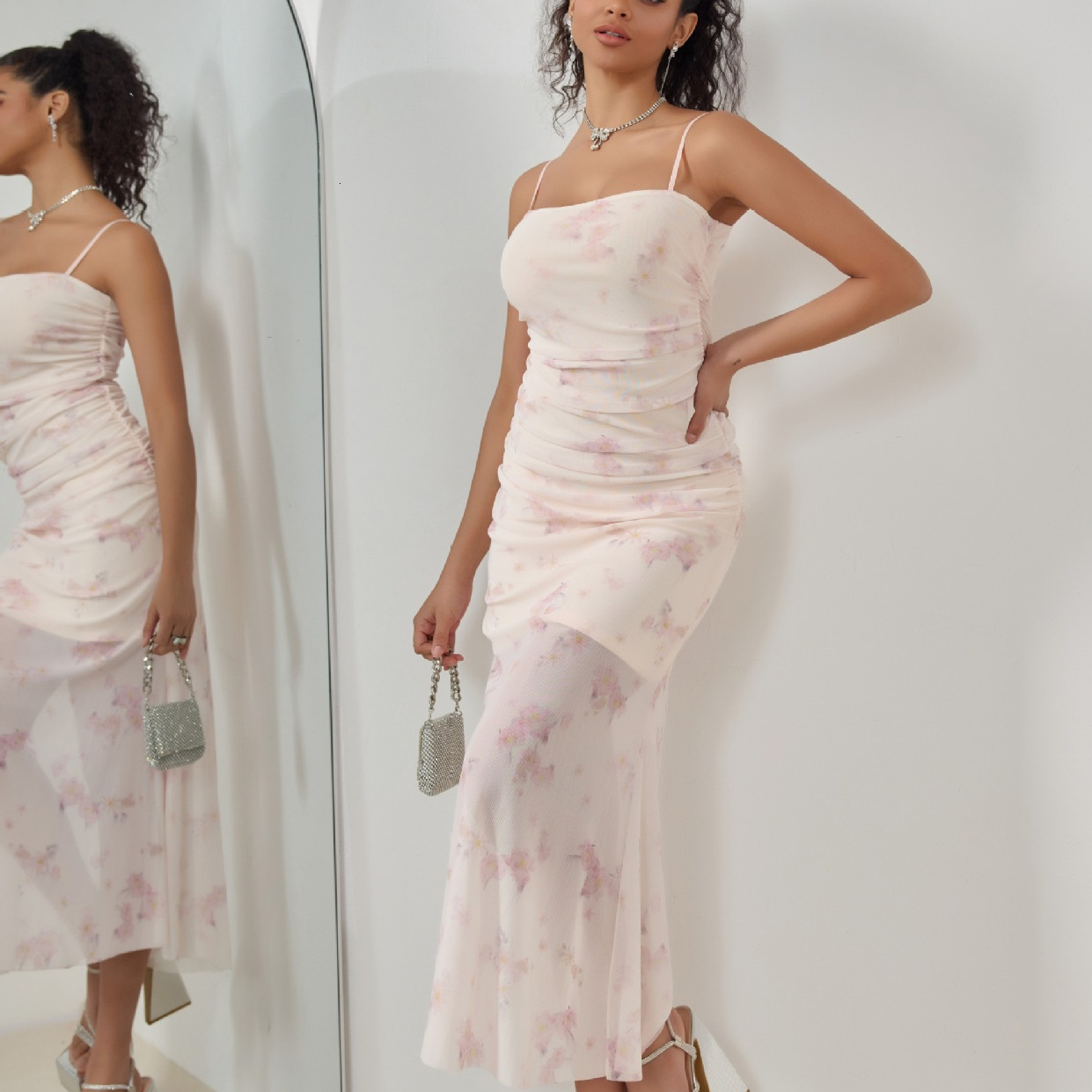 Women's clothing 2025 spring/summer new sweet printed pleated camisole dress with vacation style high elasticity fishtail long skirt