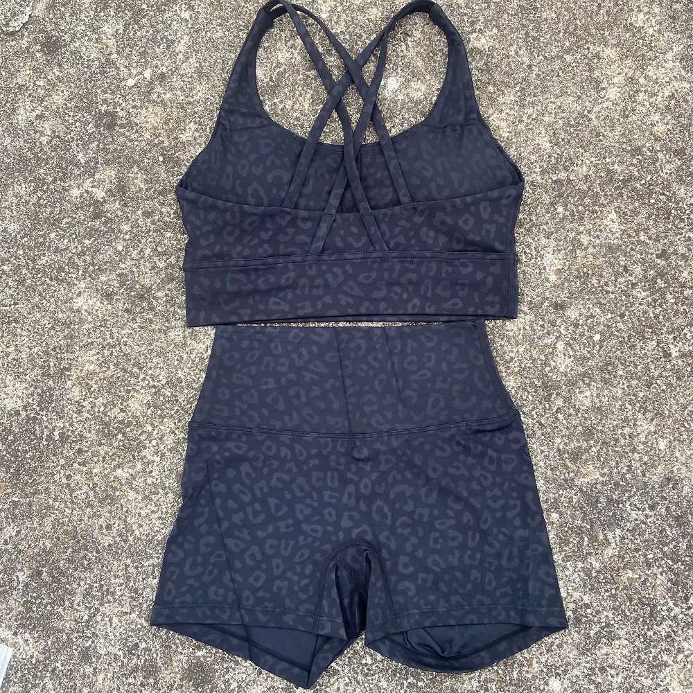 Solid color gym bicycle yoga set short leg+cross sports bra track and field suit womens gym set comprehensive training joggingW250411