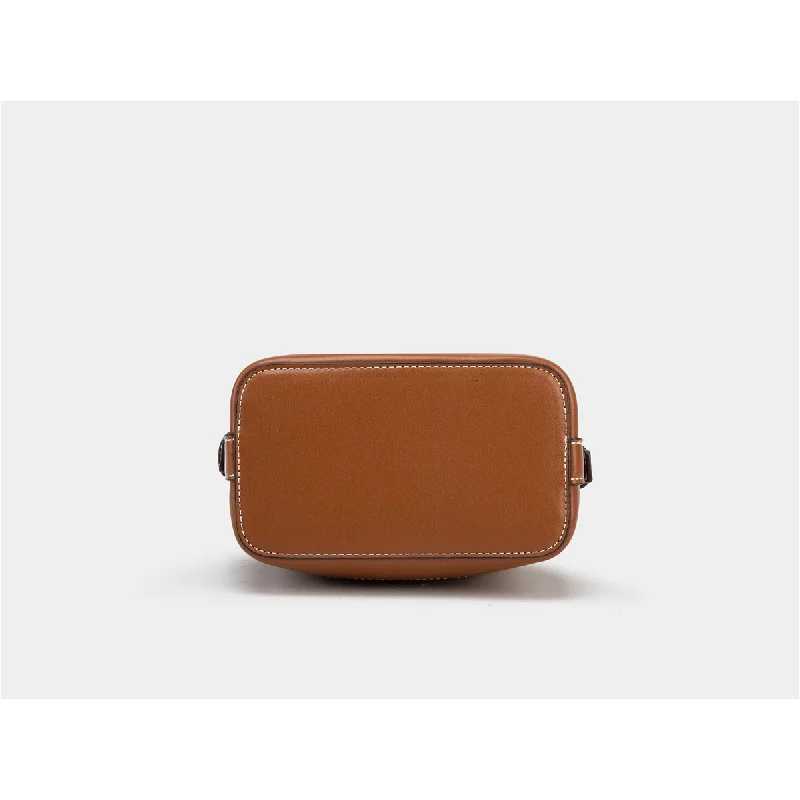 Spain 2025 new womens bag brown pleated drawstring versatile hand-held bucket bag wide shoulder strap diagonal cross bagT251110