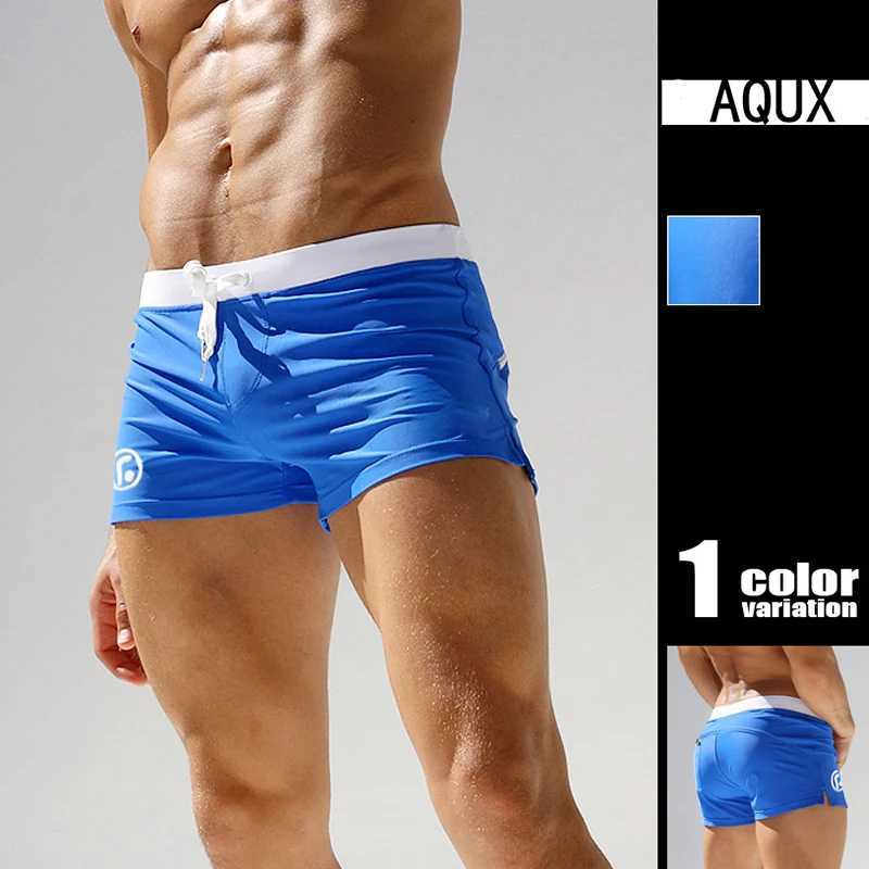 Mens swimsuit low waist surfing dry swimsuit sexy and personalized swimsuit mens pocket swimsuit beach swimsuit mens swimsuitW250410