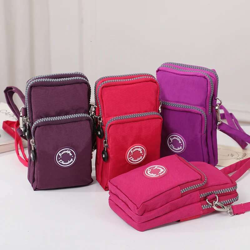 Multifunctional triple zipper nylon ladies hot crossbody portable daily running arm hundred shoulder cell phone bag