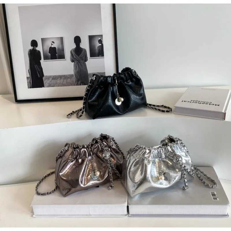 High end niche versatile diagonal chain bag womens drawstring shoulder bag bucket bag cloud bagT251110