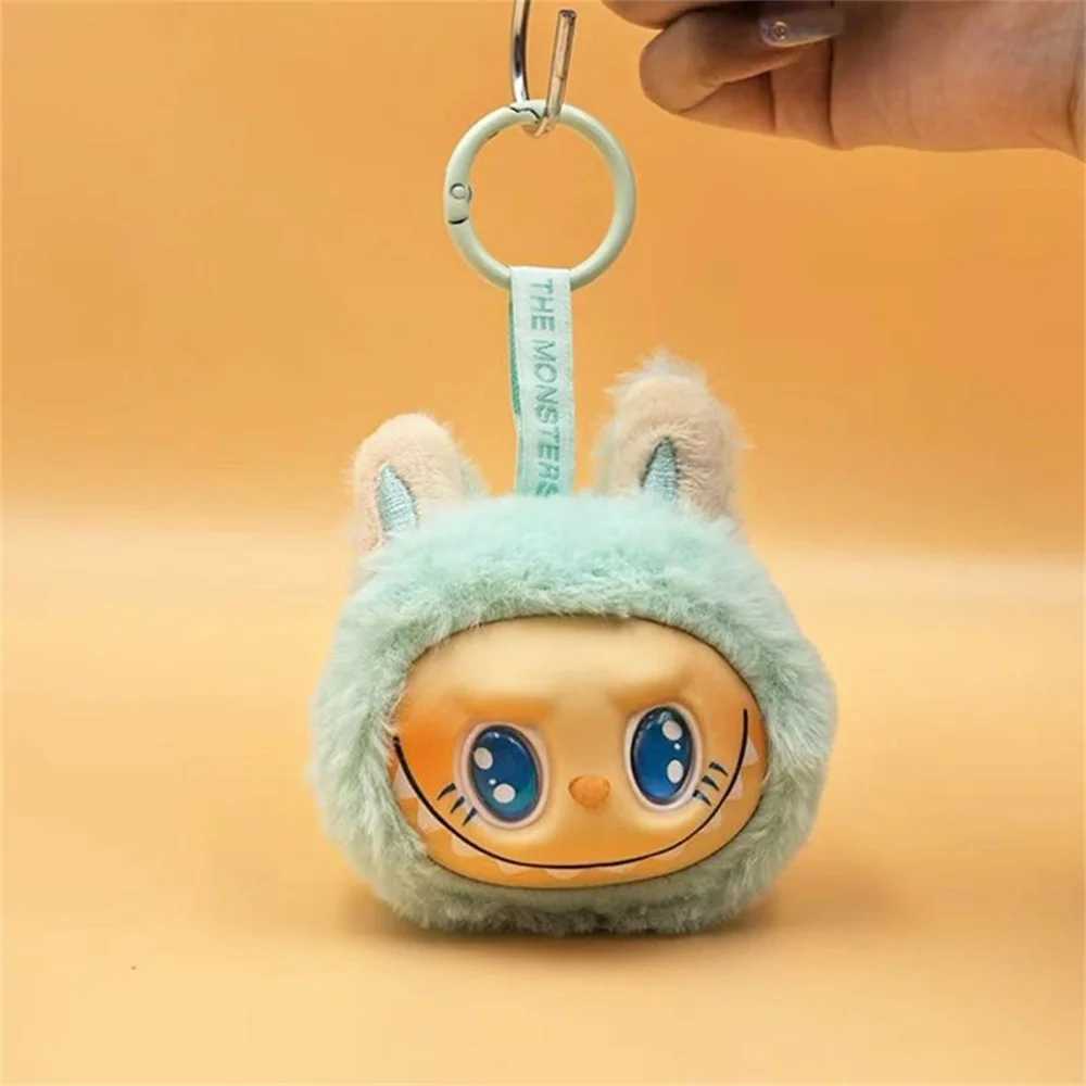 Sitting on the outside of Labubu doll keychain implanted with Fluff Pvc toy phone decoration bag charming car keychain Christmas gift W250411
