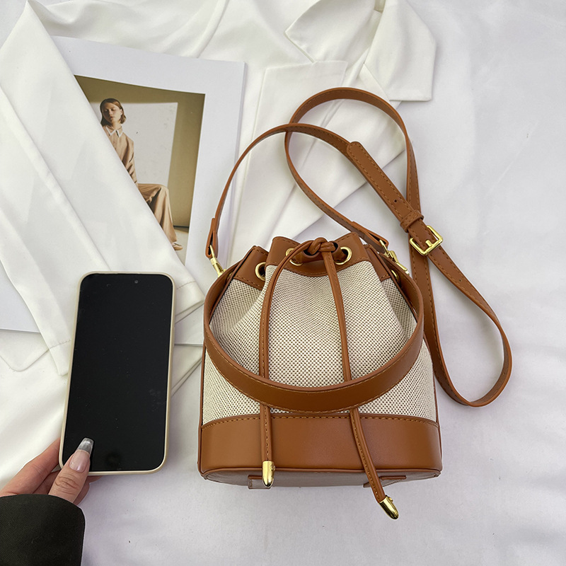 Guguo Free Shipping New Designer Bag Straw Woven Women's Bag Niche Design Fashion Retro Rattan Drawstring Bucket Bag Versatile Crossbody Bag