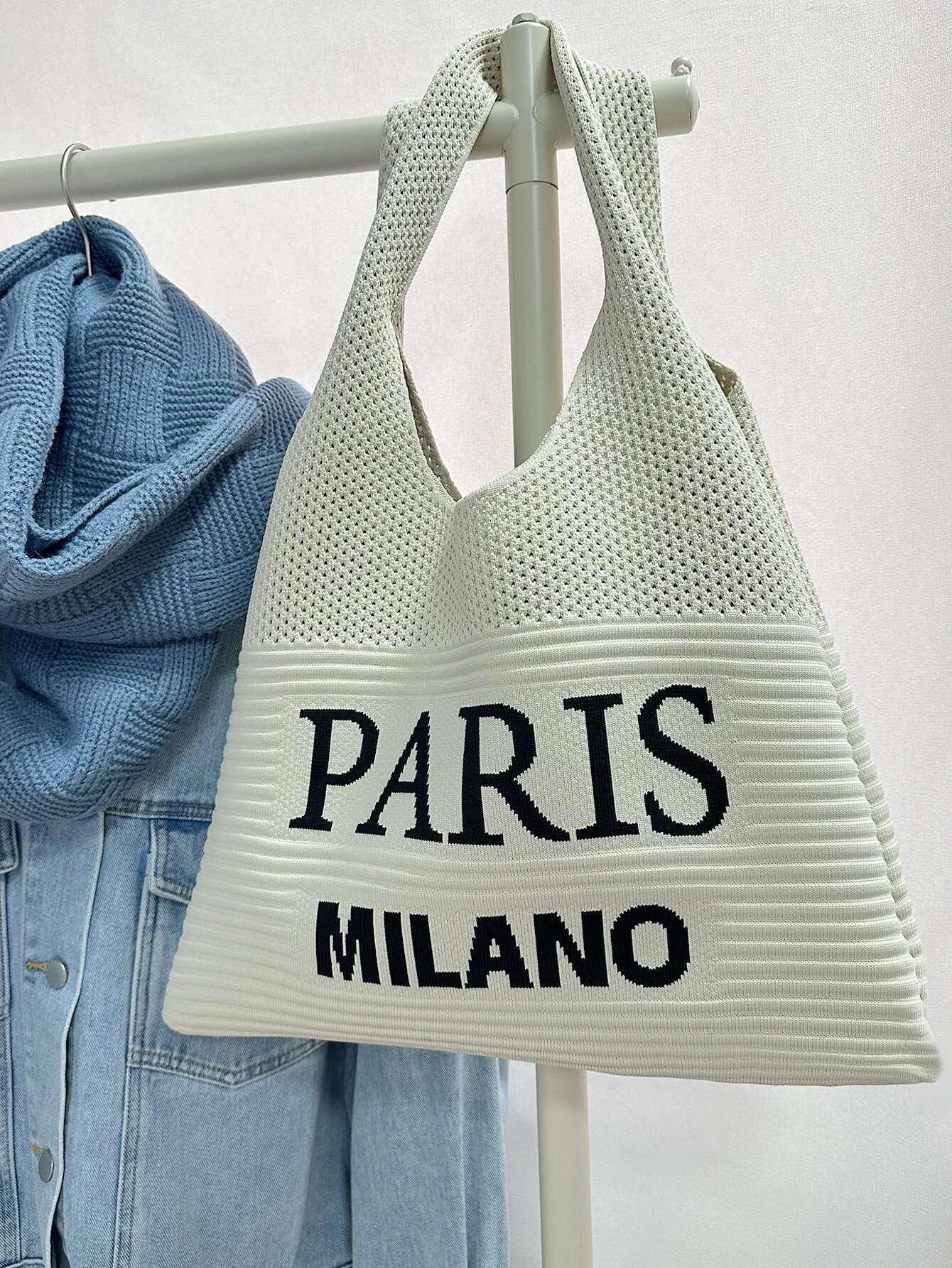 2025 new autumn and winter fashion designer women's one shoulder retro letter cut knitted handbag crochet fabric shopping2