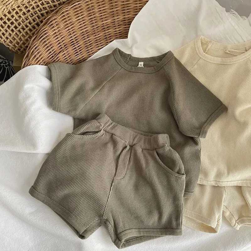 Childrens short sleeved set summer boy and girl waffle set childrens T-shirt+shorts 2-piece baby casual simple solid color set 1-6YXJ250410