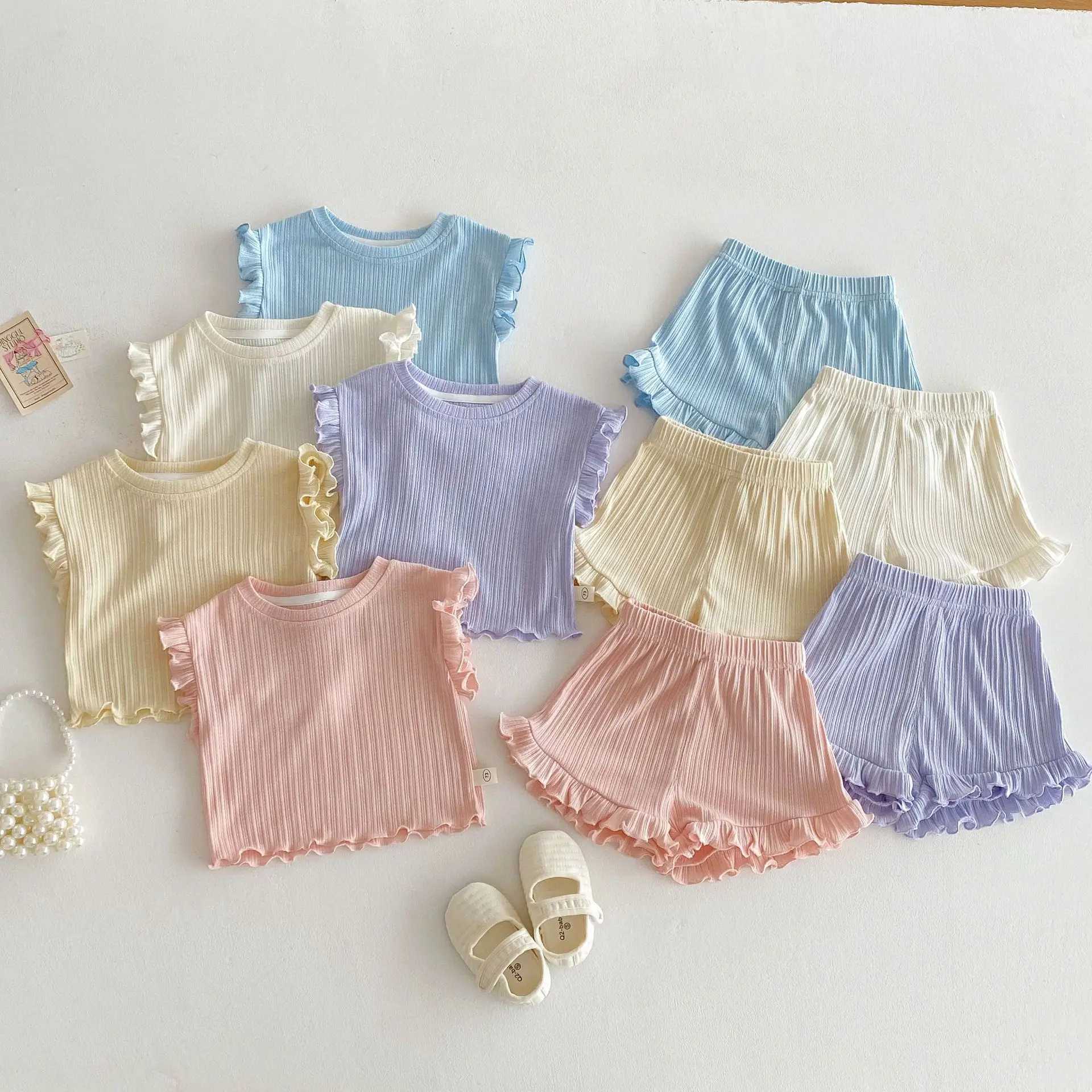 Milancel Girls sleeveless T-shirt set childrens solid color pleated vest shorts 2PCS summer set baby clothing childrens clothingXJ250410