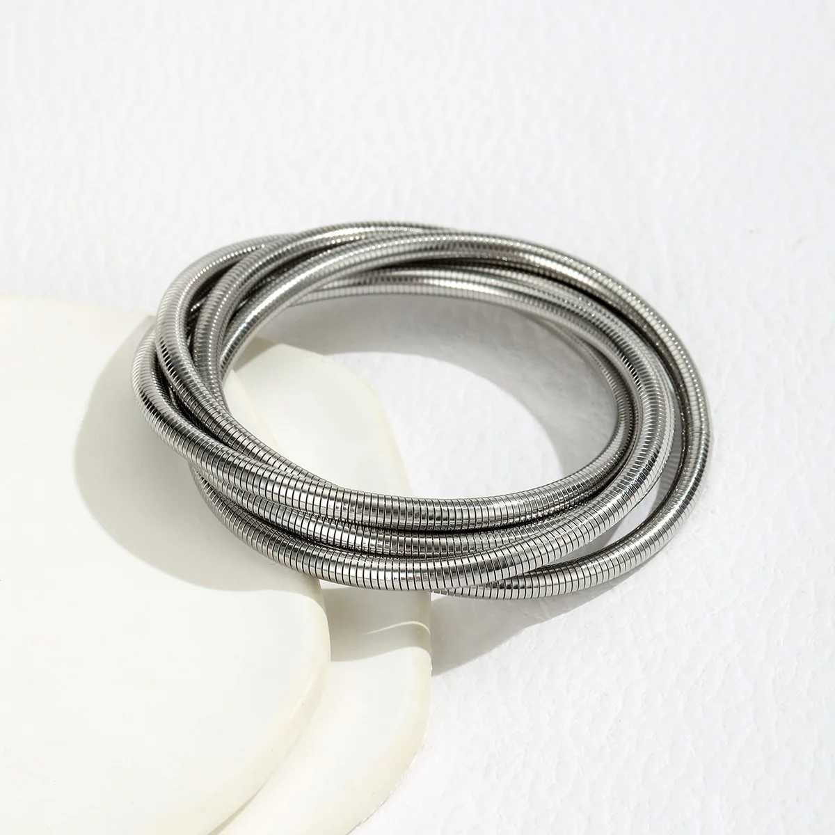 A Personalized Simple and Cool Style Multi-Layered Winding Line Spring BraceletC250410