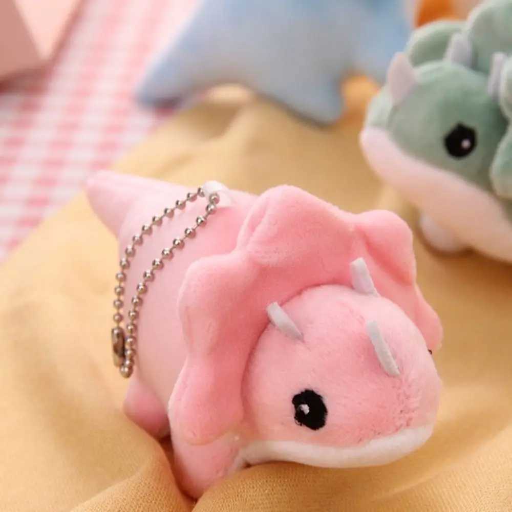 Cartoon dinosaur plush keychain soft and cute crocodile bag pendant fashionable plush filled triangular dragon keychain suspension accessories W250411
